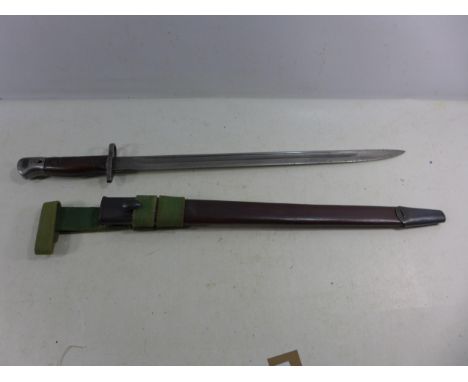 A BRITISH WORLD WAR I 1907 PATTERN BAYONET AND SCABBARD, 43CM BLADE STAMPED WILKINSON, LENGTH 57.5CM