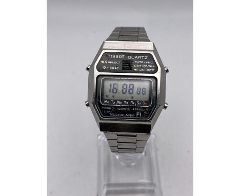 A VINTAGE 1970s TISSOT F1 QUARTZ MULTI ALARM LCD WRIST WATCH