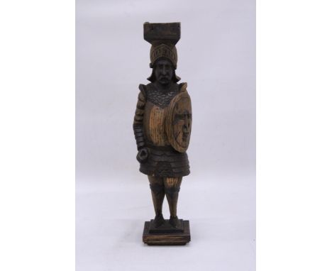 A VINTAGE WOOD CARVED KNIGHT FIGURE