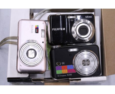 THREE CAMERAS TO INCLUDE A BOXED A1200 DIGITAL CAMERA, A KODAK V1003 AND A FUJIFILM AV150