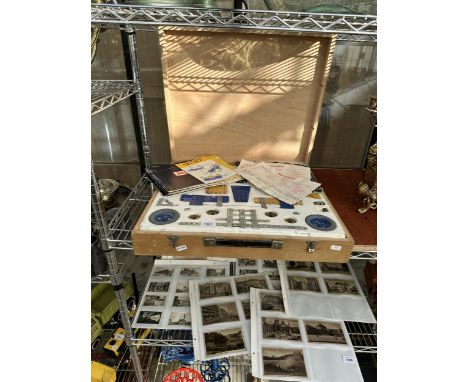 A VINTAGE MECCANO SET IN A WOODEN CASE WITH INSTRUCTIONS