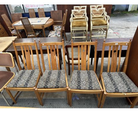 A SET OF FOUR ELM ERCOL CURVED LATH BACK DINING CHAIRS