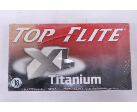 A BOXED AND SEALED SET OF 18 TOP FLITE TITANIUM XL GOLF BALLS