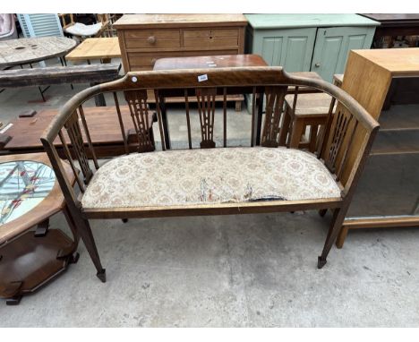 AN EDWARDIAN BEECH FRAME AND INLAID TWO SEATER SALON SOFA ON TAPER LEGS WITH SPADE FEET