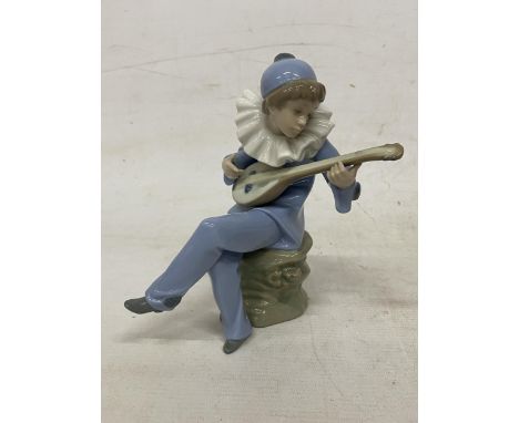 A NAO FIGURINE OF A CLOWN WITH A MANDOLIN