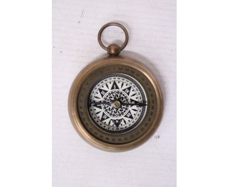 A BRASS COMPASS