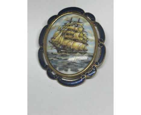 A VINTAGE THOMAS L MOTT HAND PAINTED CLIPPER SHIP PENDANT/BROOCH WITH ENAMEL SURROUND