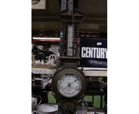 A LARGE ANTIQUE CARVED OAK ANEROID BANJO BAROMETER AND SNAIL THERMOMETER - GLASS A/F