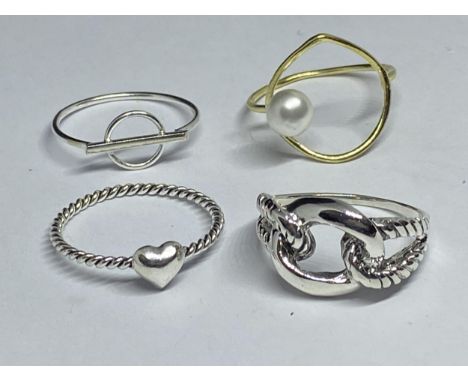 FOUR VARIOUS MARKED SILVER RINGS