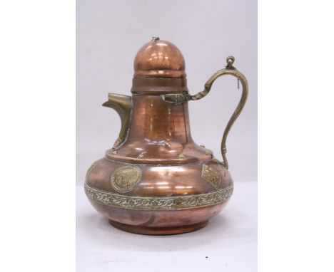 A VINTAGE COPPER JUG WITH BRASS SPOUT, HANDLE, ETC