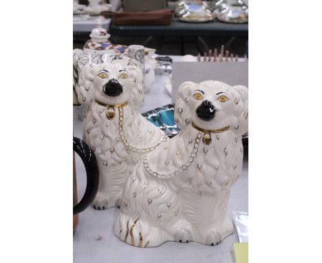 A VINTAGE PAIR OF BESWICK STAFFORDSHIRE WHITE SPANIEL MANTLE DOGS