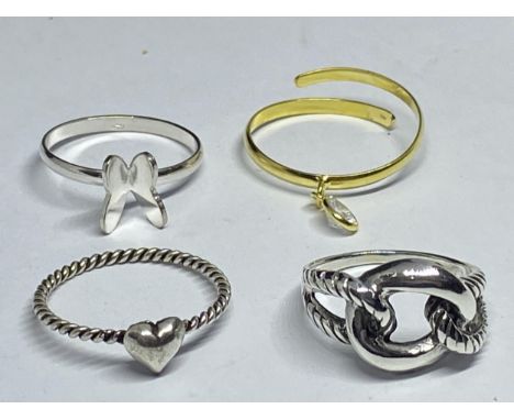 FOUR VARIOUS SILVER RINGS TO INCLUDE A GOLD PLATED EXAMPLE