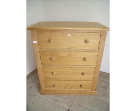 Quality modern light oak chest of four drawers (84cm x 45cm x 97cm)