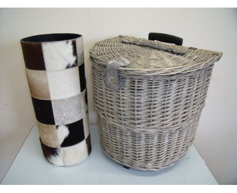 Modern cowhide stick stand and an elaborate wicker picnic basket trolley with fitted interior (2)