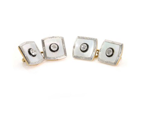 A pair of Art Deco mother of pearl and diamond cufflinks, double sided, with inset mother of pearl panels, each centred with 
