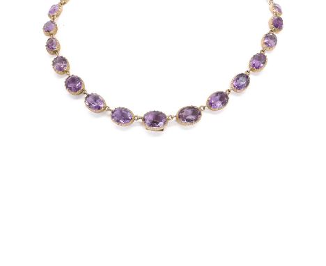 A Victorian amethyst rivière necklace, consisting in a series of graduated oval mixed cut amethysts, approximately 6 x 8mm to