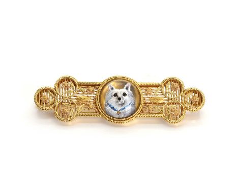 A reverse painted intaglio or Essex crystal dog brooch, by Tiffany & Co., c.1930, the reverse painted intaglio depicting a Po