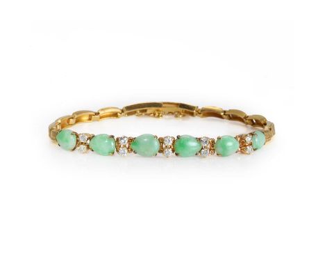 A jade and diamond line bracelet, featuring six pear shaped jade cabochons, interspaced with pairs of round brilliant cut dia