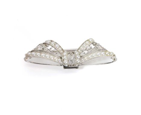 A seed pearl and diamond bow brooch, designed as a pierced bow, possibly remodelled from an earlier ribbon bow design, set wi
