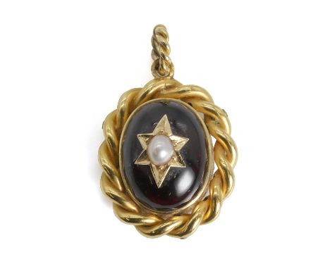 A Victorian carbuncle garnet memorial locket pendant, the foiled oval cabochon garnet with applied split pear star set to the