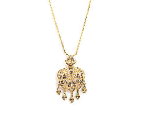 A seed pearl and sapphire drop pendant, the pendant pierced and grain set throughout with floral and foliate clusters of roun