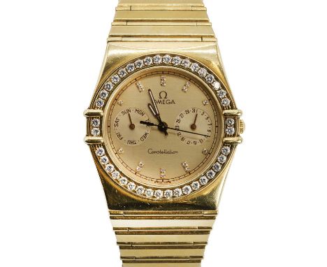 An 18ct gold diamond set Omega Constellation quartz bracelet watch, c.1986,  ref. 496.1070, with a 32mm tonneau-shaped case, 