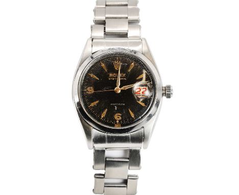 A gentlemen's stainless steel Rolex Oyster-Date mechanical bracelet watch, c.1950,  ref.6494, the 34mm case, with a black dia