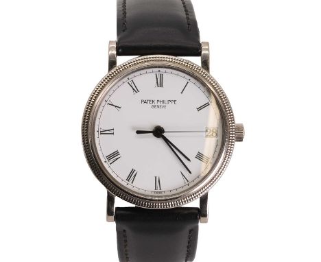 A gentlemen's 18ct white gold Patek Philippe Calatrava mechanical strap watch,  ref. 3802/200, with a circular case, 32mm in 