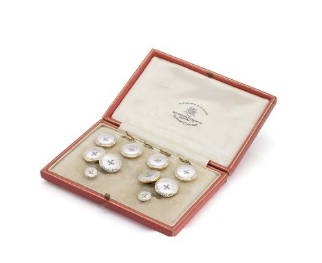 An 18ct gold and mother of pearl dress stud set, comprising four dress studs/buttons, a pair of cufflinks and two smaller stu