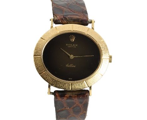A gentlemen's 18ct gold Rolex Cellini mechanical strap watch, c.1970,  ref. 3881; the horizontal oval case, 33mm, with a blac
