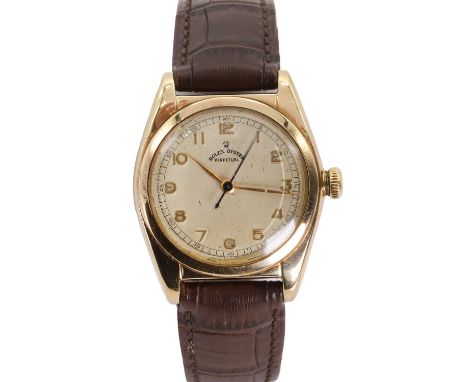 A gentlemen's 14ct gold Rolex Oyster Perpetual automatic strap watch,  ref. 5050, 32mm case, with a silvered dial, raised gil