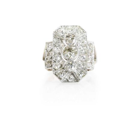 An Art Deco diamond plaque ring,  with three collet set old cut diamonds forming a vertical cluster, the principal stone esti
