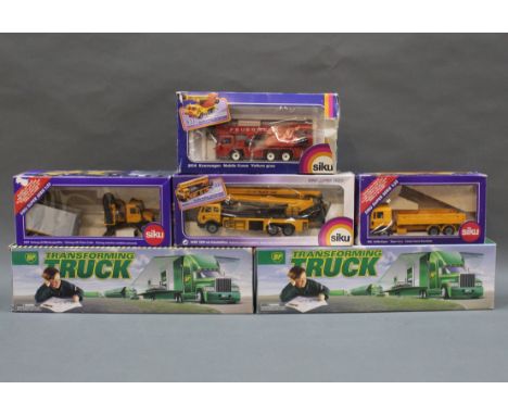 A group of six boxed diecast model construction and commercial vehicles, comprising Siku and BP.