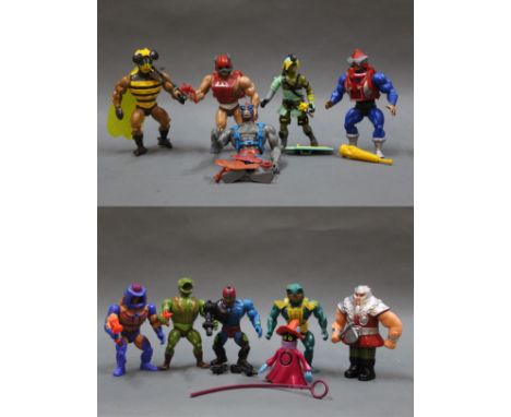 A group of 11 Masters of The Universe and Dungeons &amp; Dragons action figures:- Ogre King, Trapjaw, Merman, Ram Man, Man E 