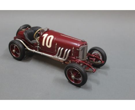 A CMC 1:18 scale Mercedes Targa Florio, 1924, racing car, with original box and packaging.  