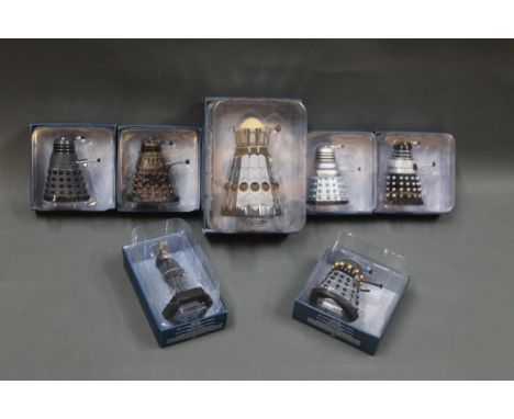 A group of 7 Eaglemoss Doctor Who scale model Daleks and a Dalek SEC Hybrid