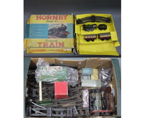 A Hornby 0 Gauge No.21 passenger train set, comprising a 60985 locomotive and tender, 2 coaches and track, together with a bo