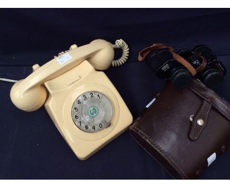 Ivory coloured vintage telephone along with pair of mid 20th Century binoculars