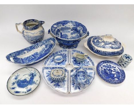 A collection of blue and white Spode i.e. bowls, jugs, pots, plates, tureens, miniature cream and sugar bowls. A.F.
