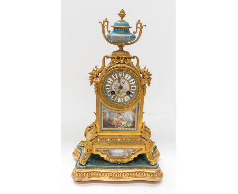 French 8 day gilt metal mantle clock and gilt wood stand. A lovely decorative clock with turquoise enamel panels .3 1/2" porc