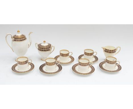 A Wedgwood pattern no: 8593 six piece coffee service to include: coffee pot, sugar bowl and cover, milk jug, 6 coffee cans &a