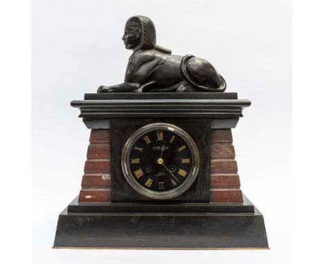 Victorian Egyptian revival slate mantle clock, with sphinx to top. Two train French movement .4 1/2" Black dial with gold col