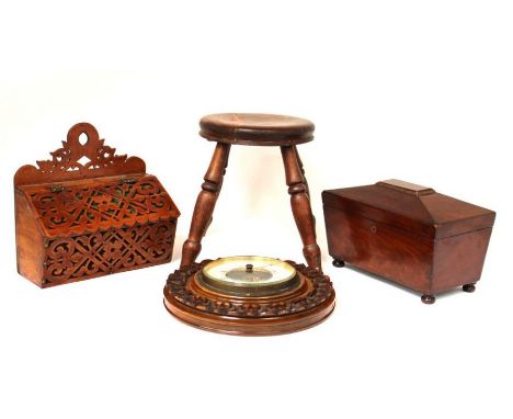 A collectors lot to include: A small 20th century wooden rocking chair, a wooden tea caddy with bun feet (no innards), a wood