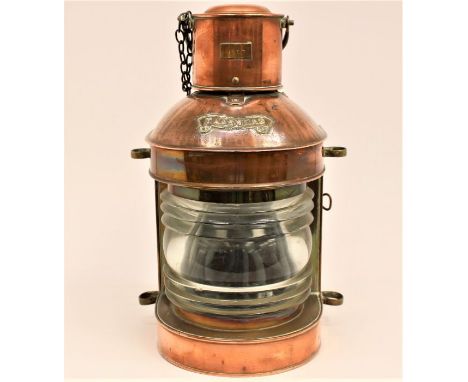 A large copper ships lamp, with "Masthead" plaque in brass to front.