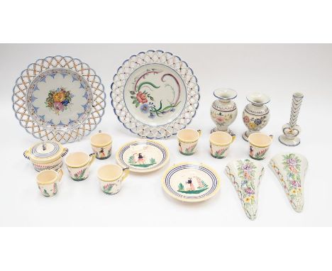 A collection of Quimper French pottery wares, i.e. ribbon plates, vases, wall plaques, cups, plates etc