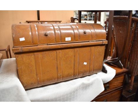 An early to mid 20th century metal trunk