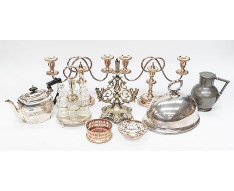 A small collection of silver plated items to include; two candelabra, an elaborate plated epergne/posy holder, plated tea pot