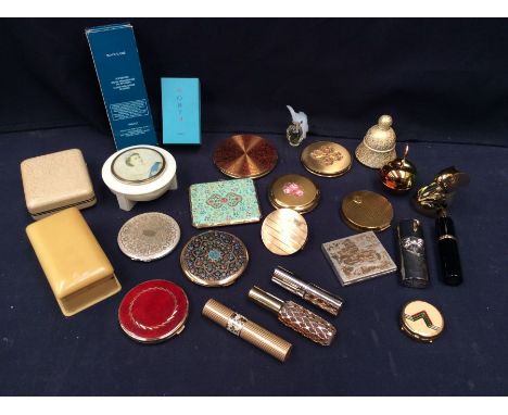 Collection of ladies vintage perfumes and compacts.