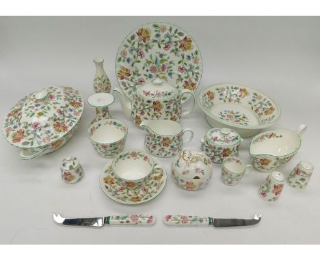 An extensive collection of Minton 'Haddon Hall' patterned dinner service to include; Two tea pots, meat platters, dinner, sid