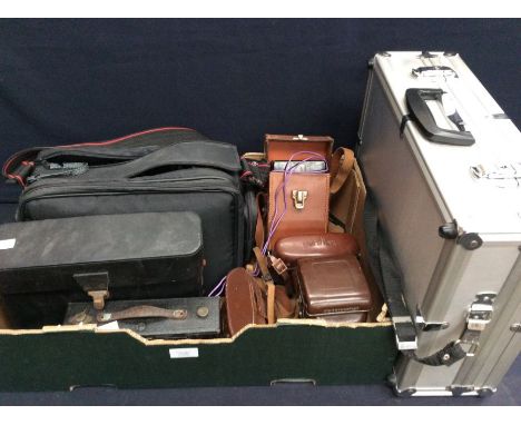 A collection of vintage cameras, video cameras, including Canon aluminium case with accessories, Yashica Mat Periflex etc